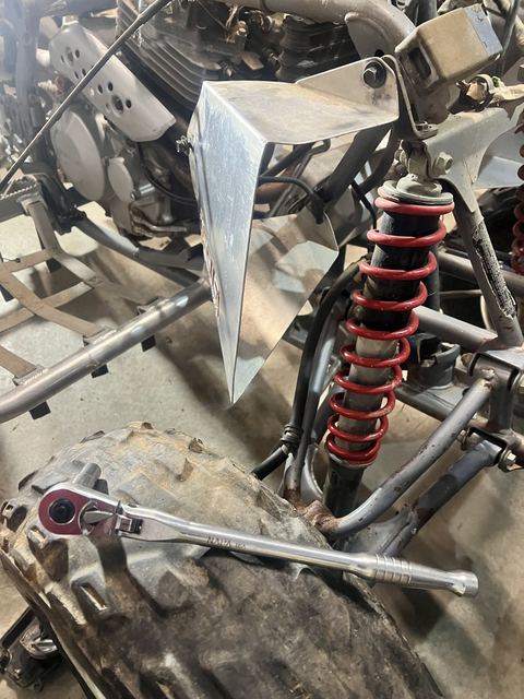 ATV front end and shock suspension detail during repair