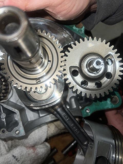 Close-up of engine gear train and crankshaft during rebuild